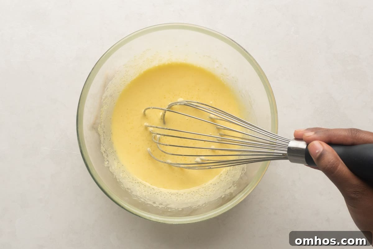 Picture showing how to whisk yolks till they are light and creamy