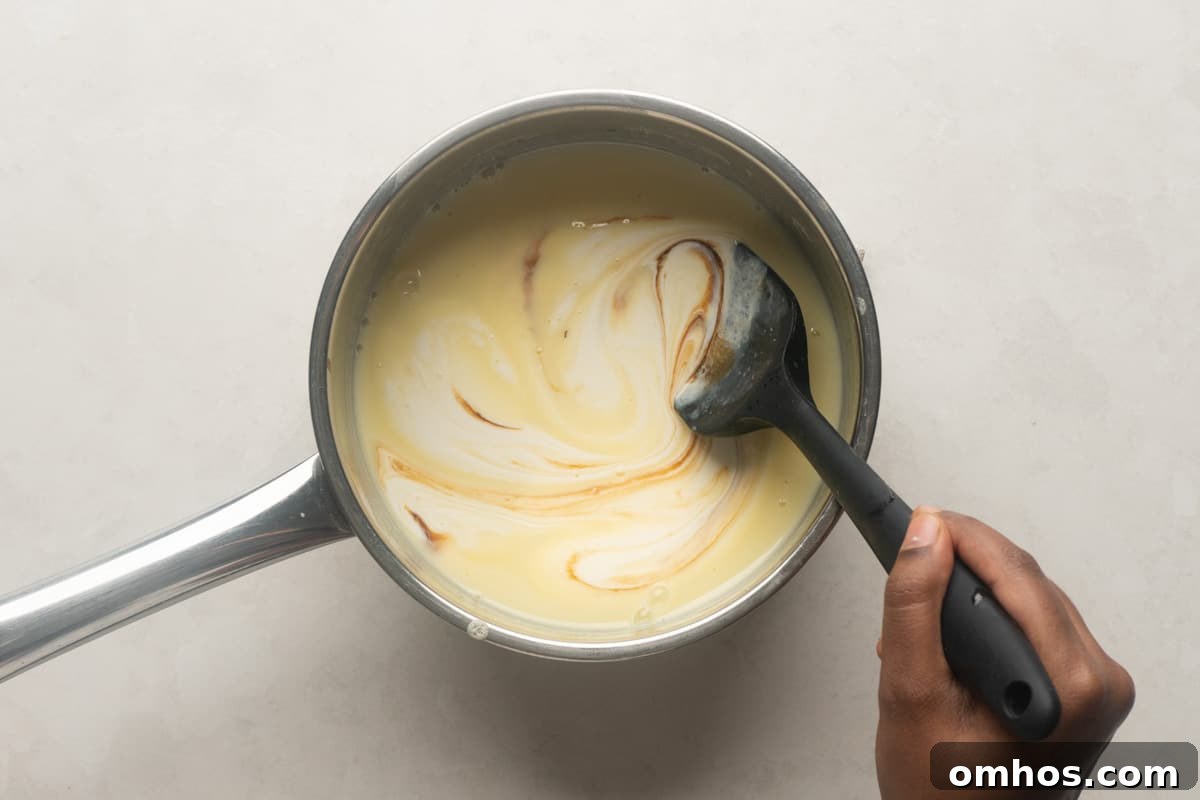 Picture incorporating vanilla and cream into eggnog