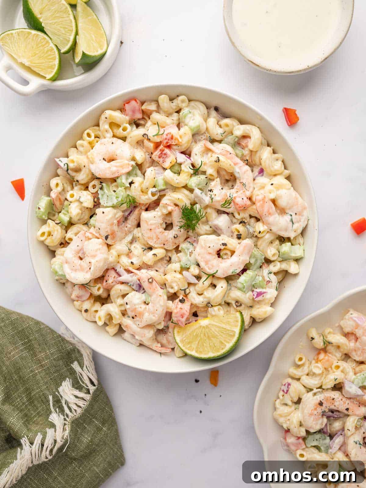 A bowl of macaroni shrimp salad.