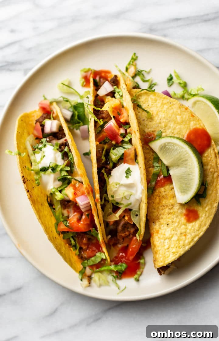 baked beef tacos on a plate