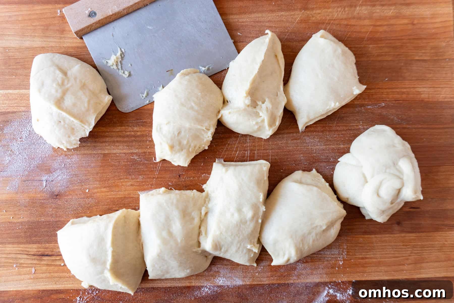 Fluffy Soft Dinner Rolls: Buttery Homemade Recipe 11 bread dough cut into 9 pieces.