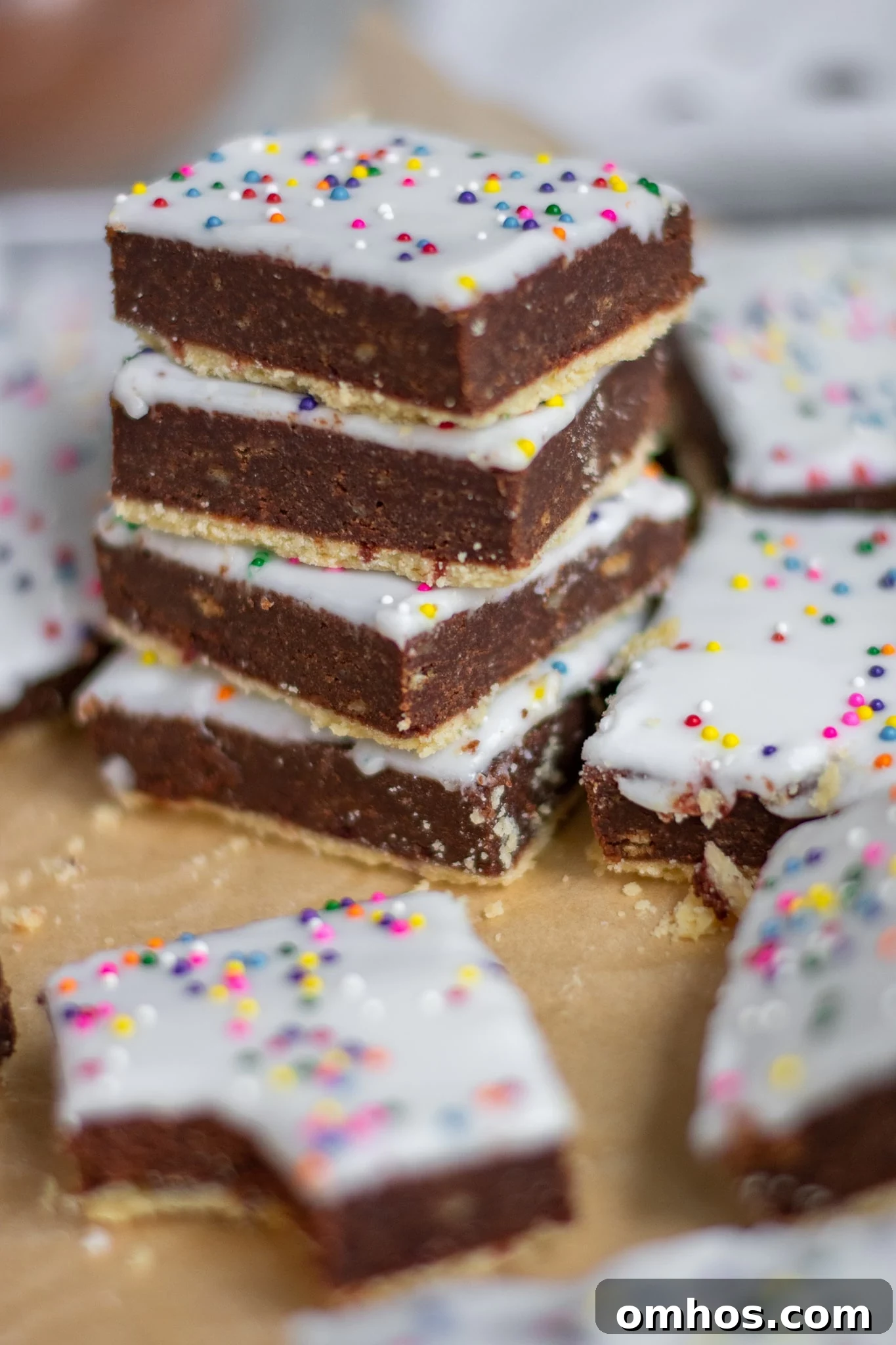 Studenterbrød: Norwegian Student Bread Pastry Recipe 2 Pastries with chocolate cake and icing.