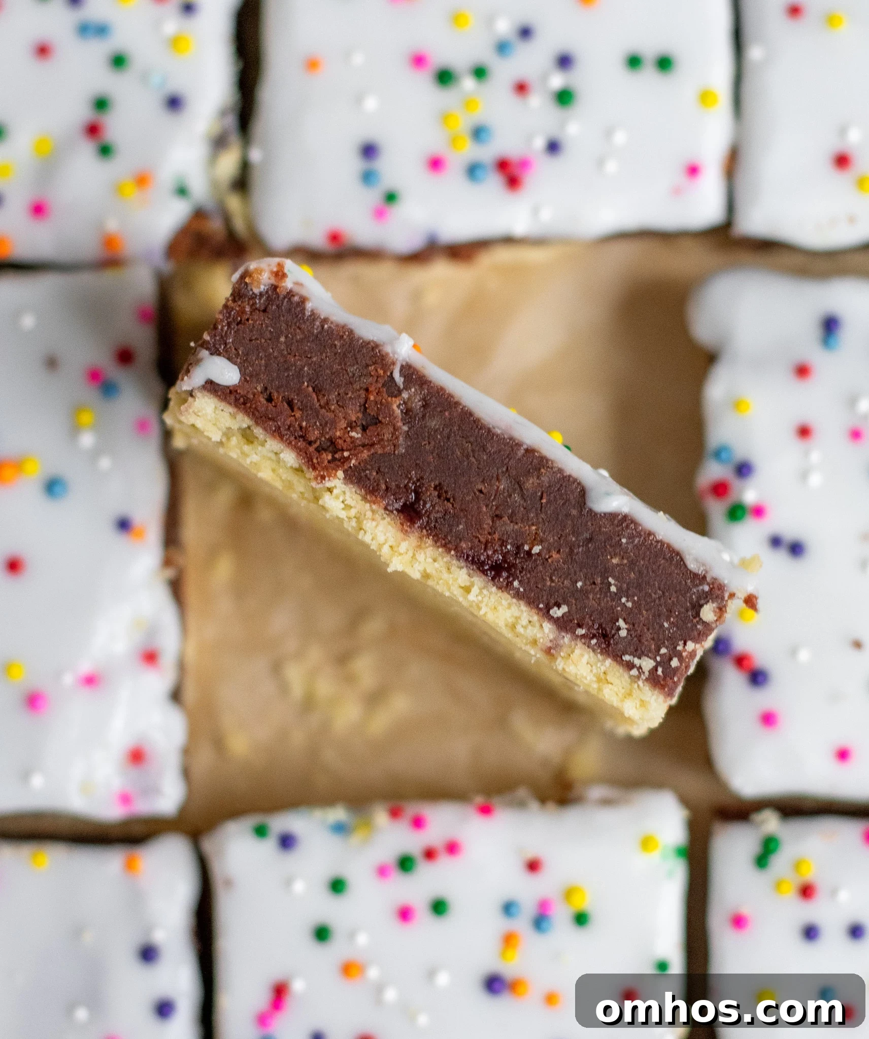 Studenterbrød: Norwegian Student Bread Pastry Recipe 4 Pastries with chocolate cake and icing.