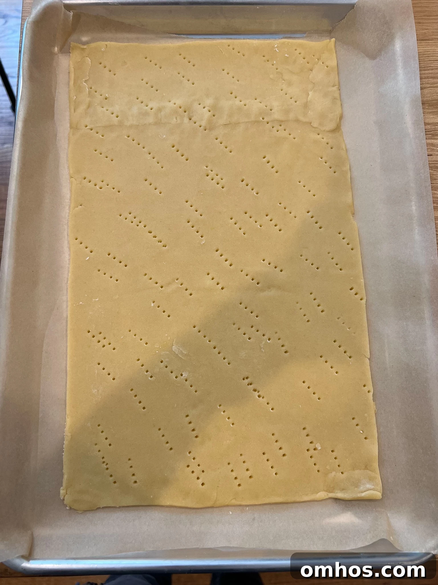 Dough with holes in it.
