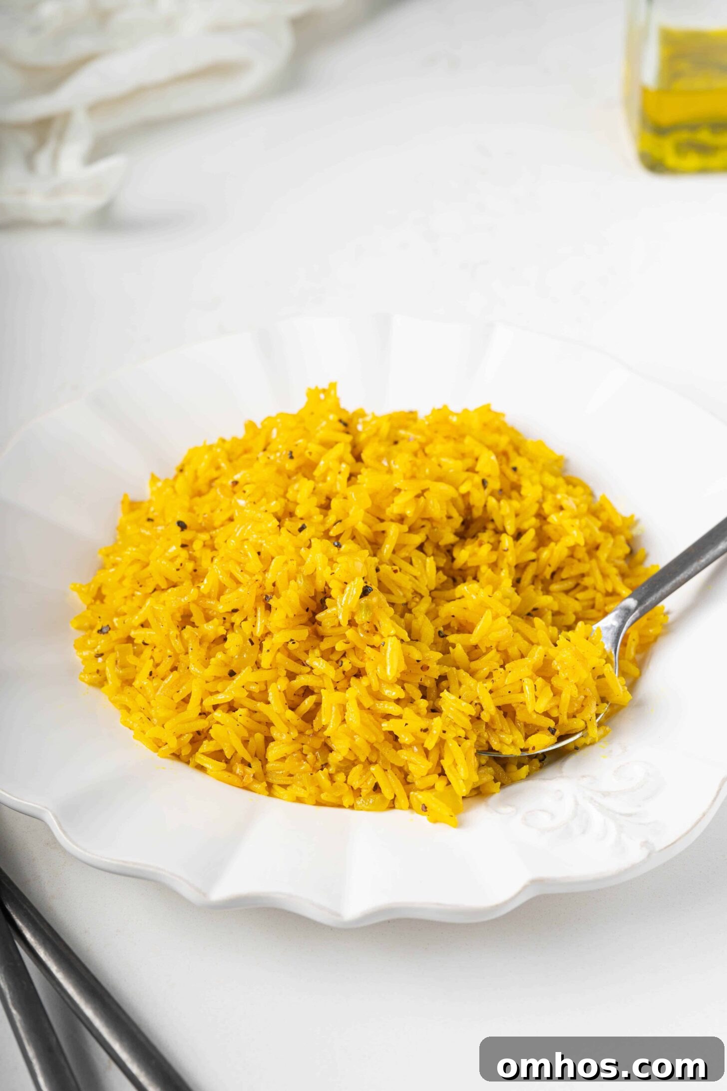 Turmeric Basmati Rice Recipe: Light and Fluffy 6 turmeric basmati rice on a plate