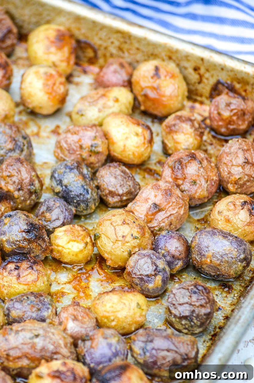 Crispy Roasted Potatoes with Mayonnaise 4 mayonnaise roasted potatoes on a rimmed baking sheet
