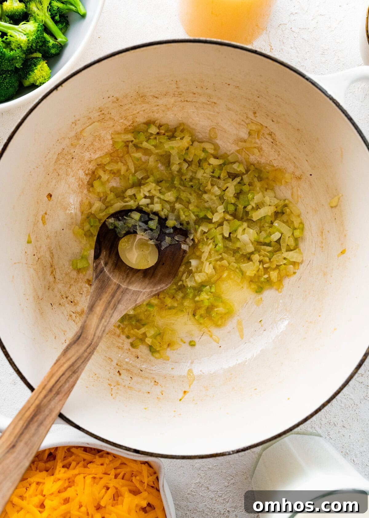 How to Make Copycat Panera Broccoli Cheddar Soup step-by-step: add the veggies and cook.