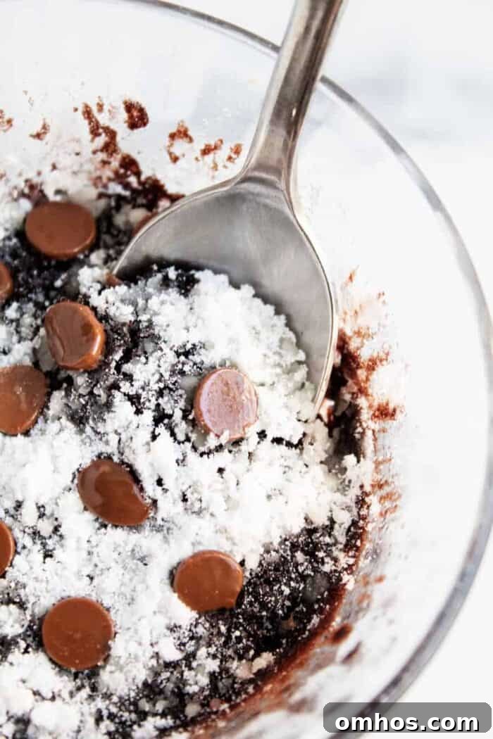 closeup of keto mug brownie with a spoon inside dish