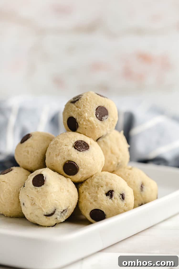 low carb gluten free keto cookie dough fat bombs with chocolate chips on serving dish