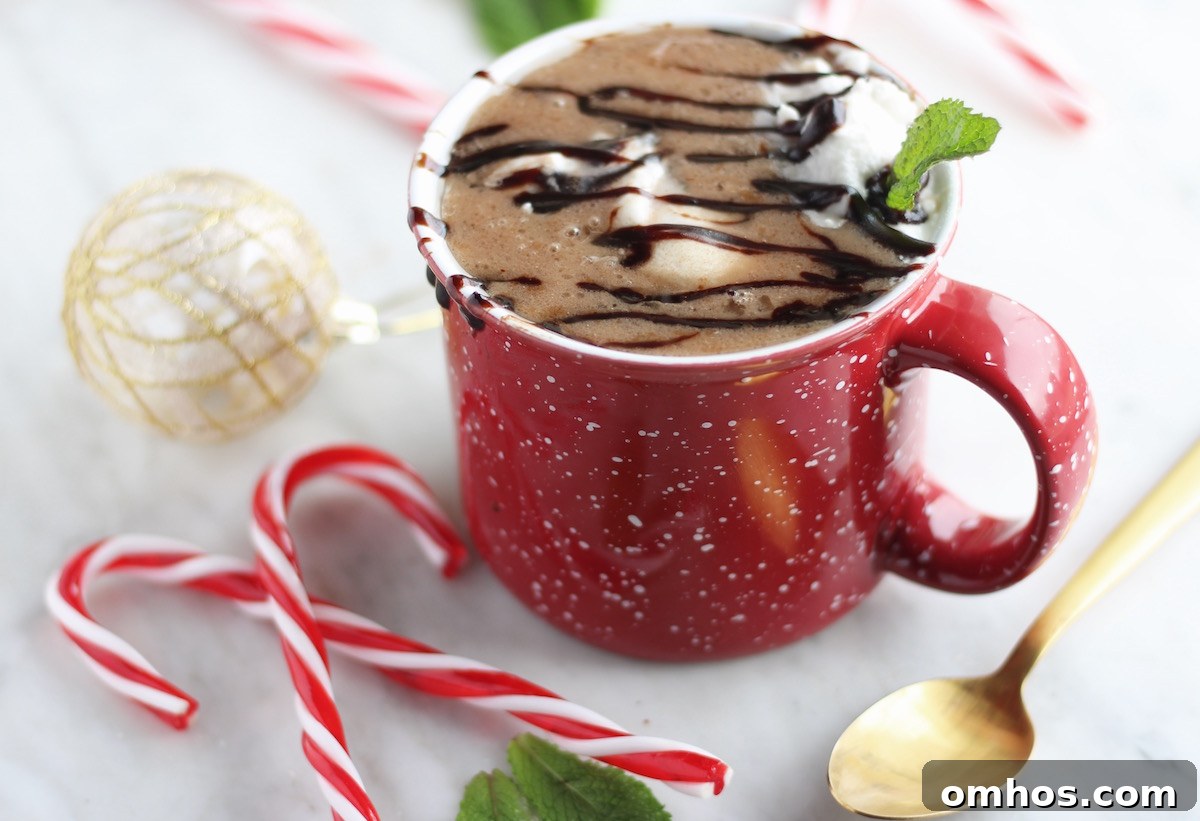 Cozy AIP Peppermint Hot Cocoa Recipe (Paleo) and Waiting Well 7 AIP Peppermint Hot Cocoa (Paleo) - this festive drink features peppermint tea-infused coconut milk, carob, honey, and creamy clouds of peppermint whip and a dark carob sauce