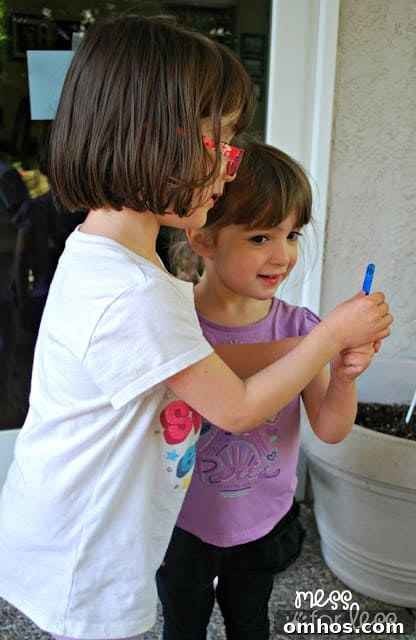 children with popsicle stick