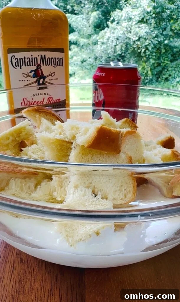 making the bread pudding in a bowl