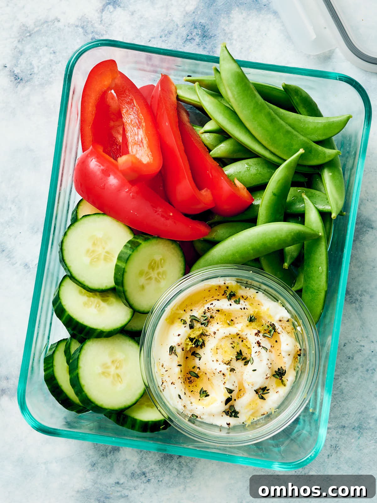 Creamy Whipped Ricotta Dip with Honey 9 Whipped ricotta dip in a meal prep container with fresh veggies.