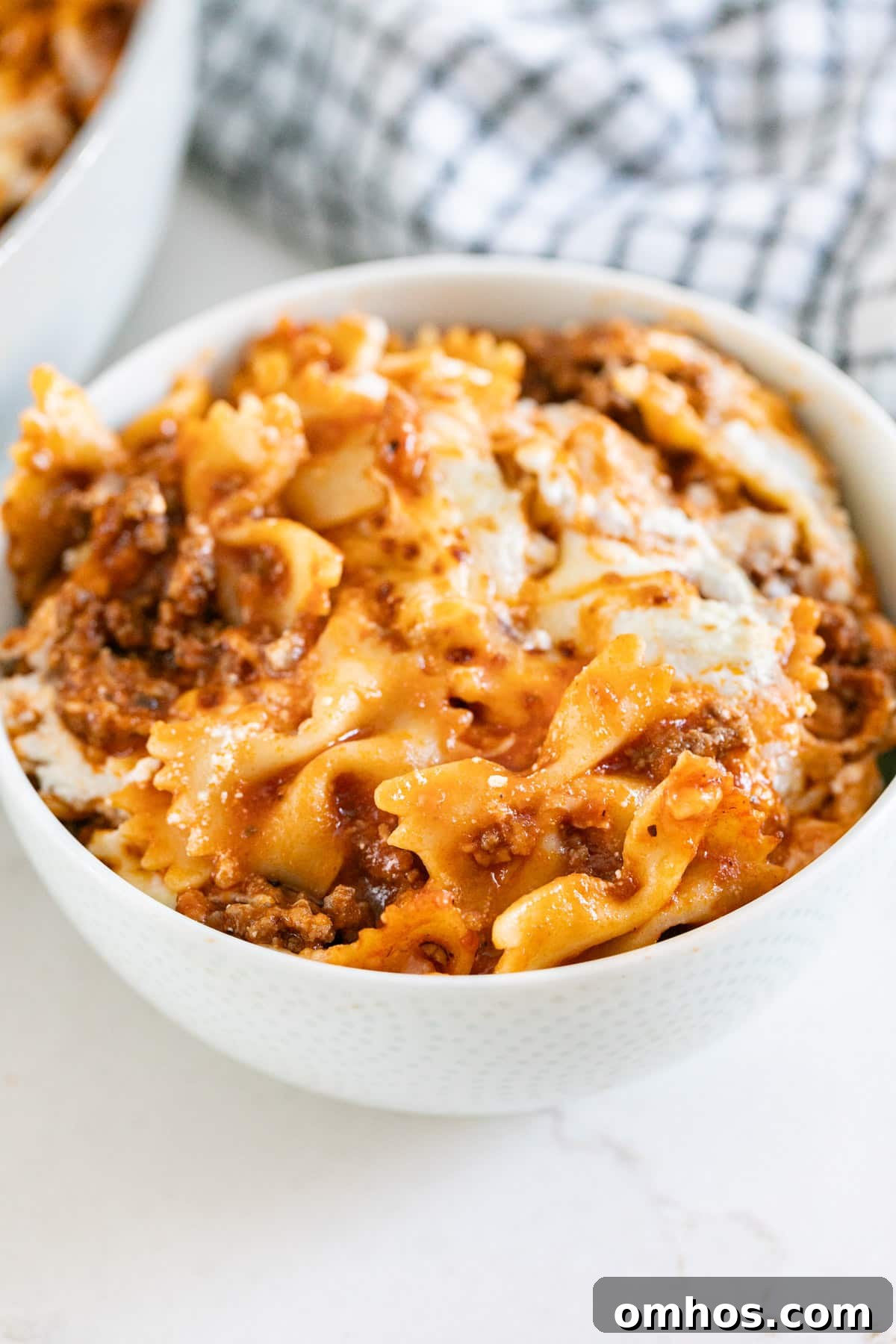 A close up image of a bowl of no bake lasagna skillet.