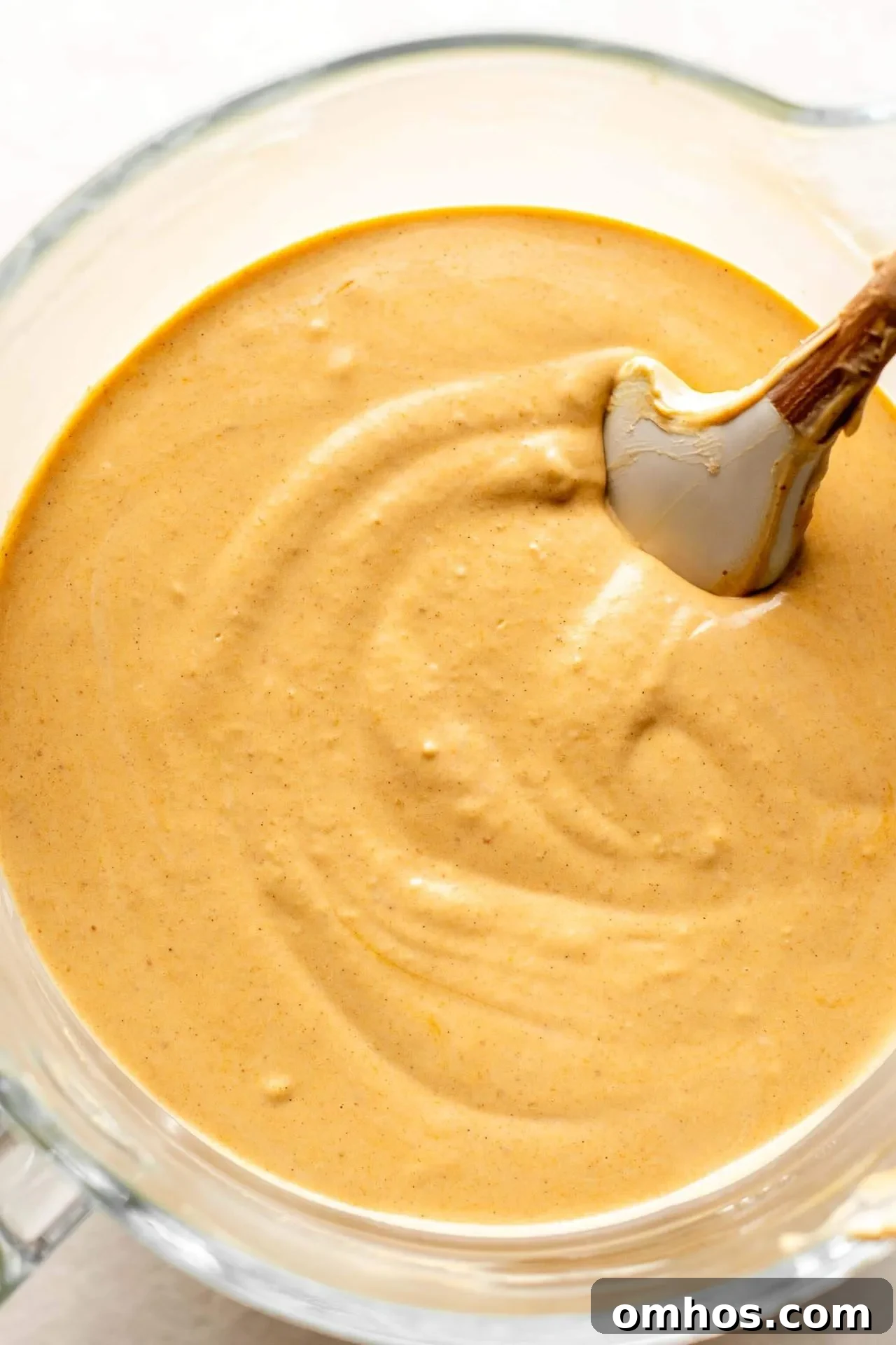 Creamy Pumpkin Cheesecake Recipe 4 pumpkin cheesecake batter in bowl