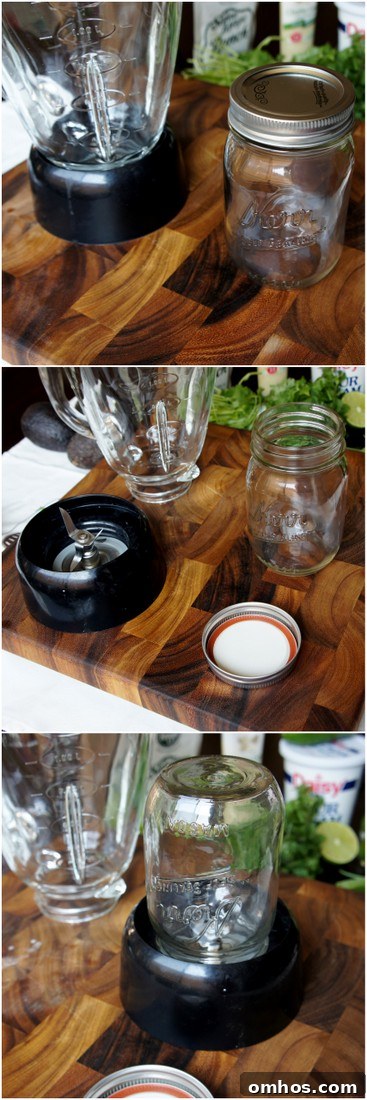 A blender blades, an empty mason jar, a mason jar lid and blender on a cutting board