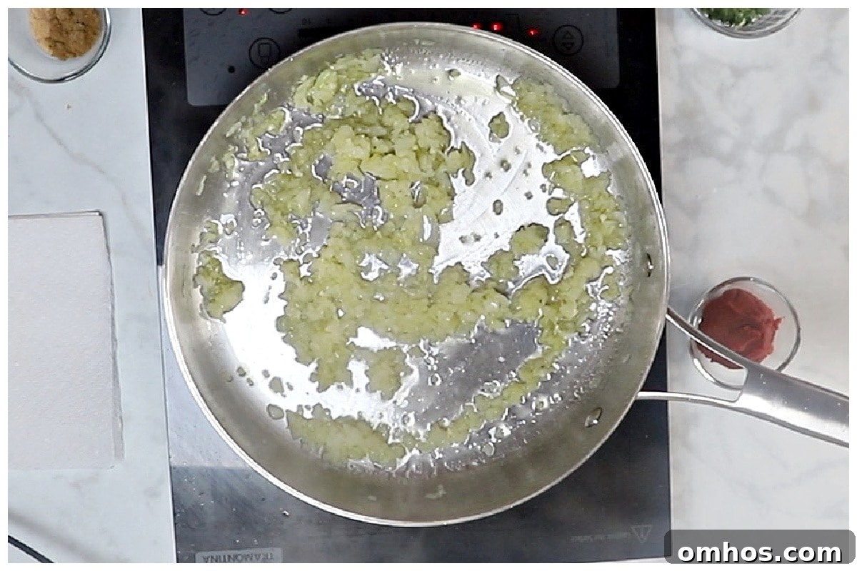 Sauteed onion and garlic in a large skillet.