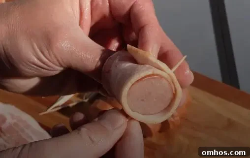 assembling the kielbasa and bacon for shots