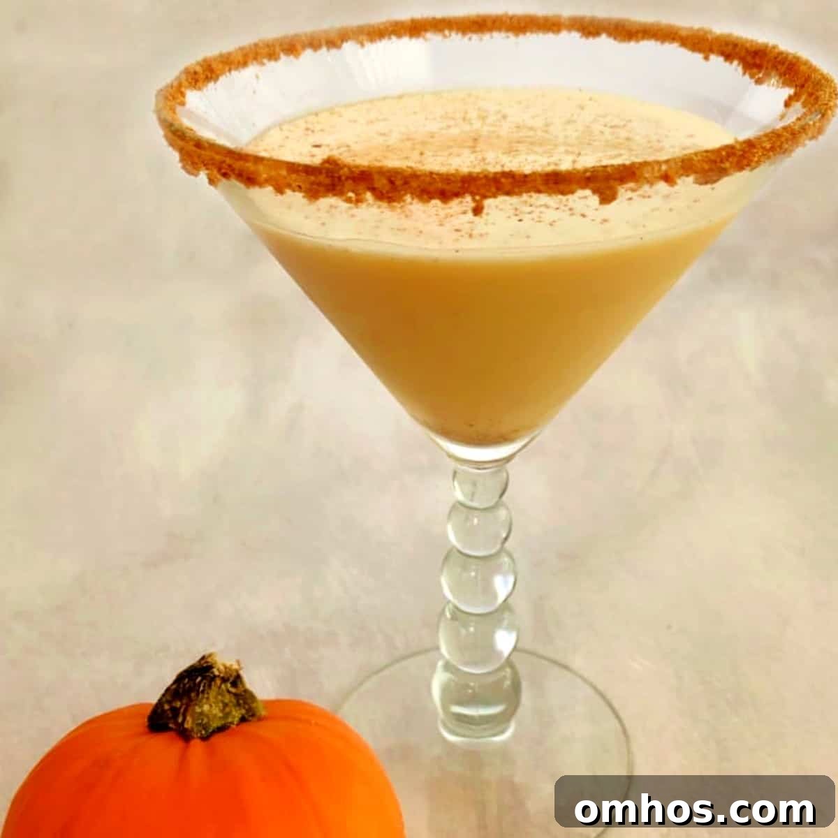 pumpkin spice martini in a martini glass