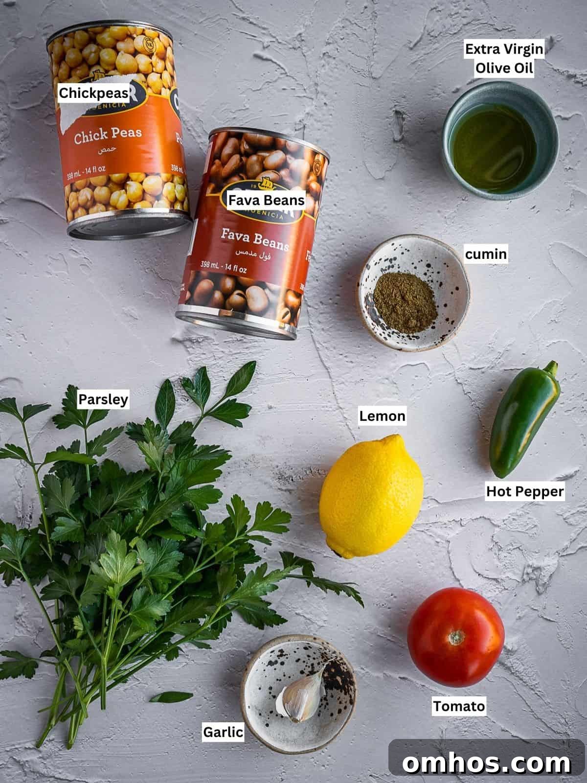 Individually labeled ingredients for this recipe on a board.