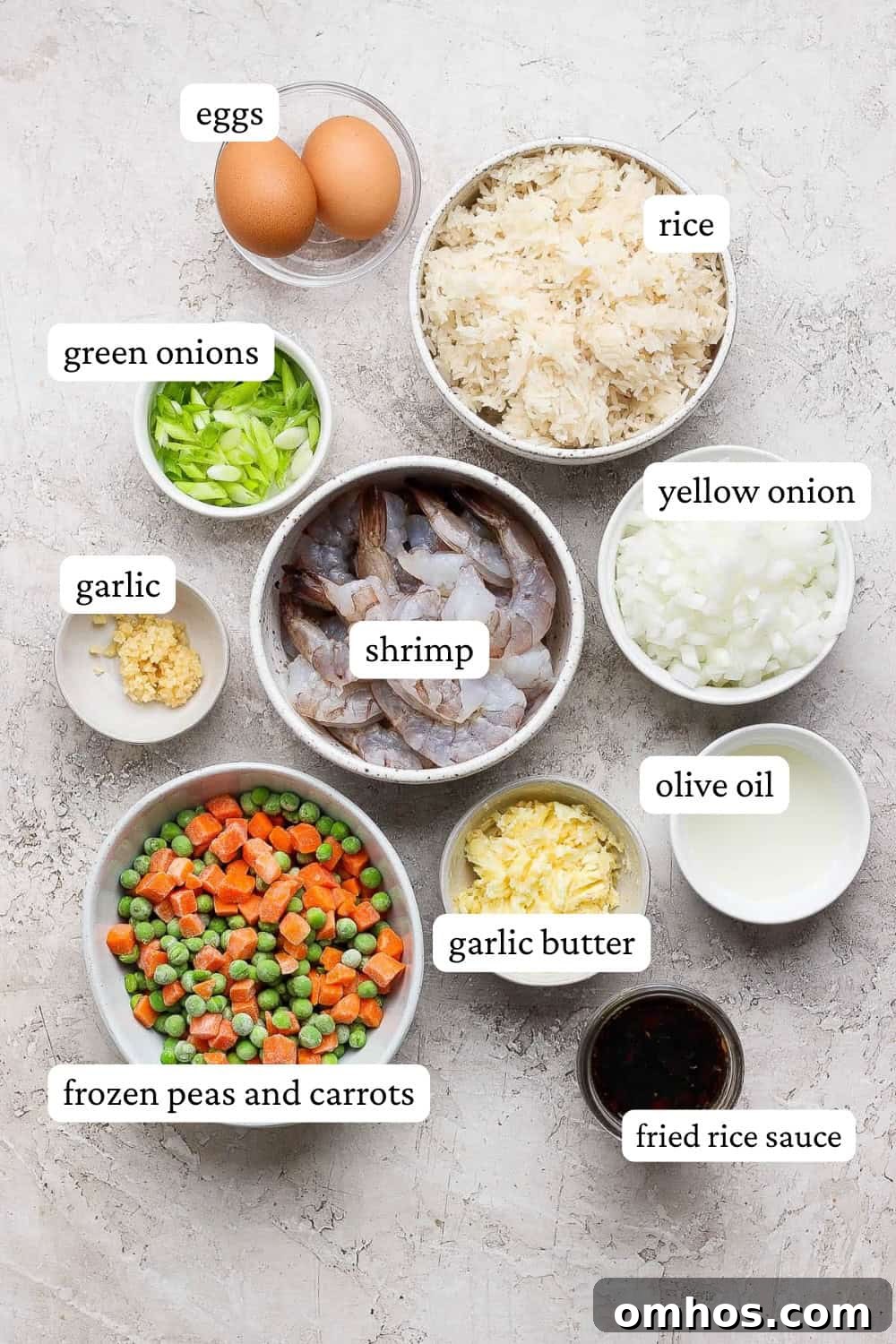Blackstone shrimp fried rice ingredients in separate bowls with labels.