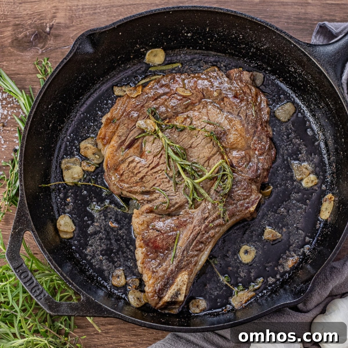 cast iron ribeye steak with garlic and rosemary