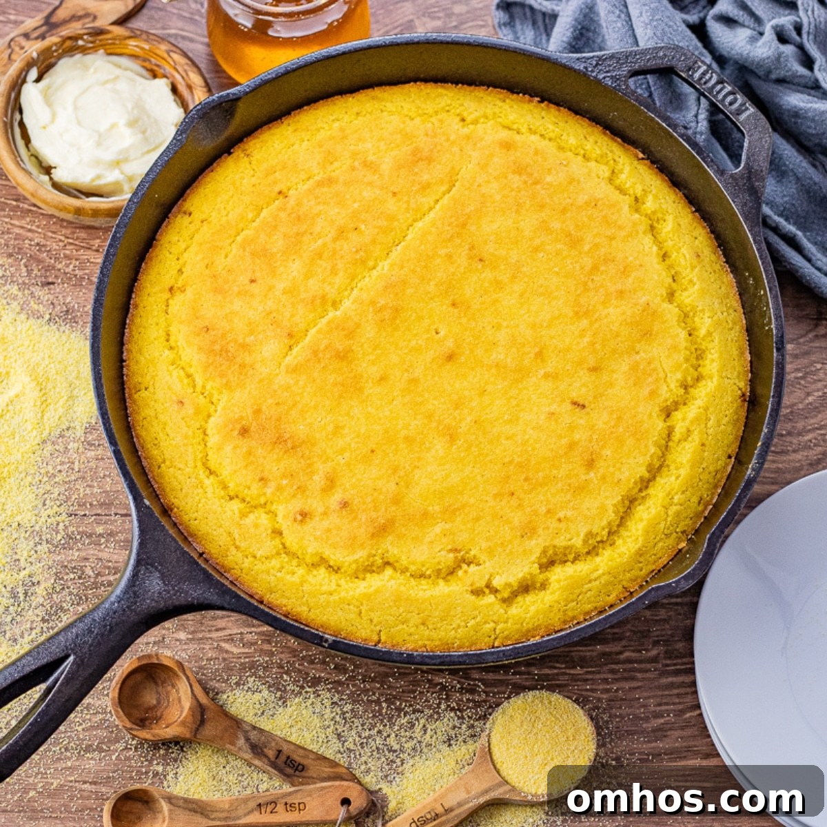 cast iron pan filled with cornbread
