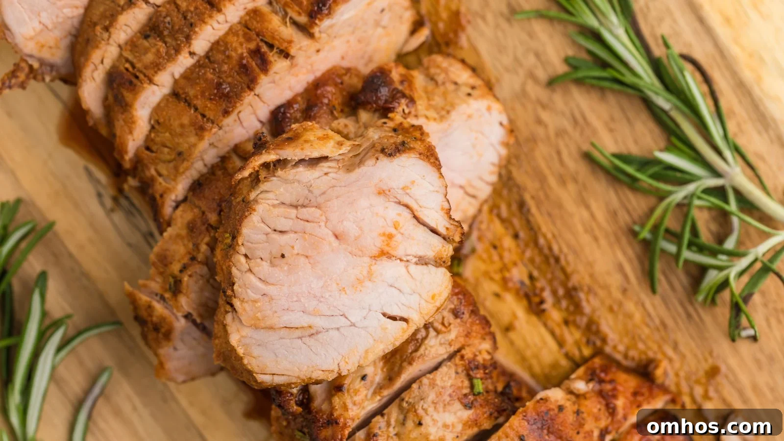 Pork tenderloin cooked in the air fryer until browned outside and tender in the center.