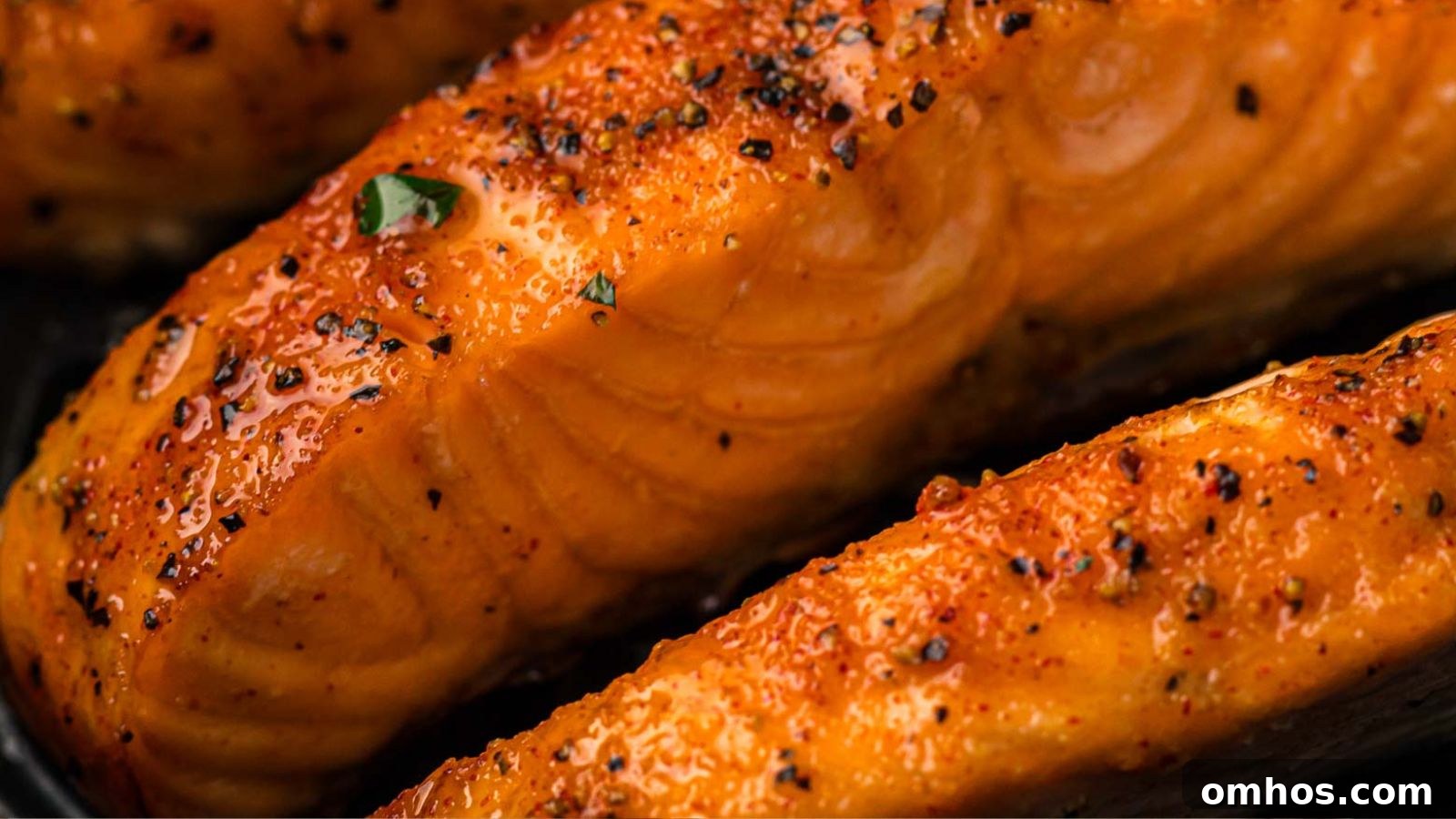 Salmon fillets air fried until flaky with lightly crisp edges.