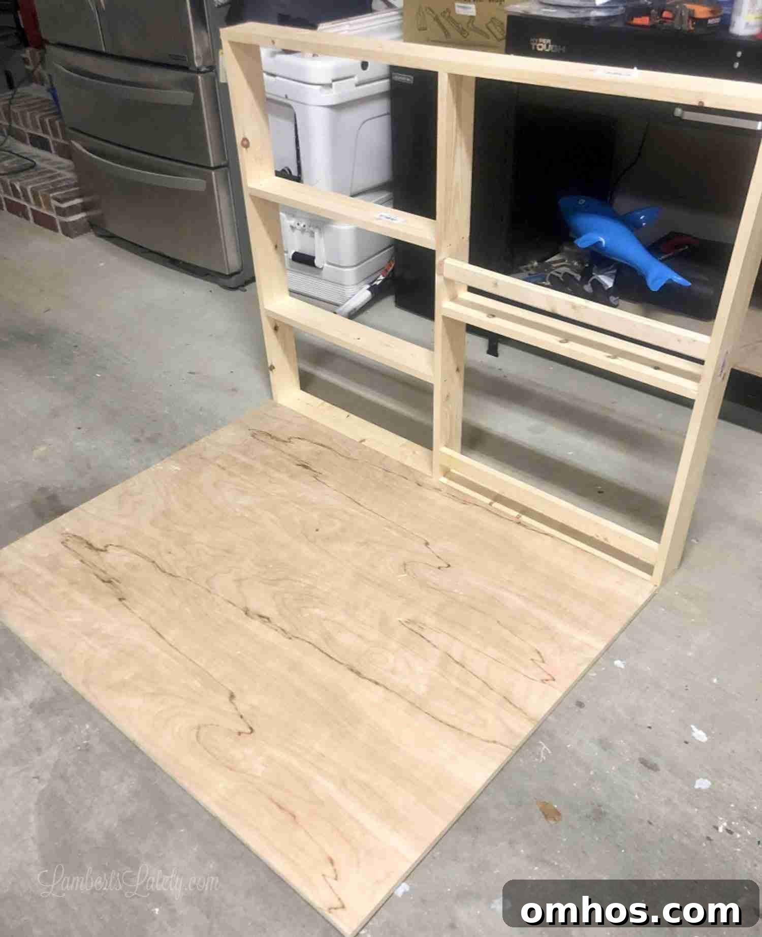DIY Murphy Bed with Built-In Desk and IKEA Bookcases 14 fold-out desk assembled, before painting.