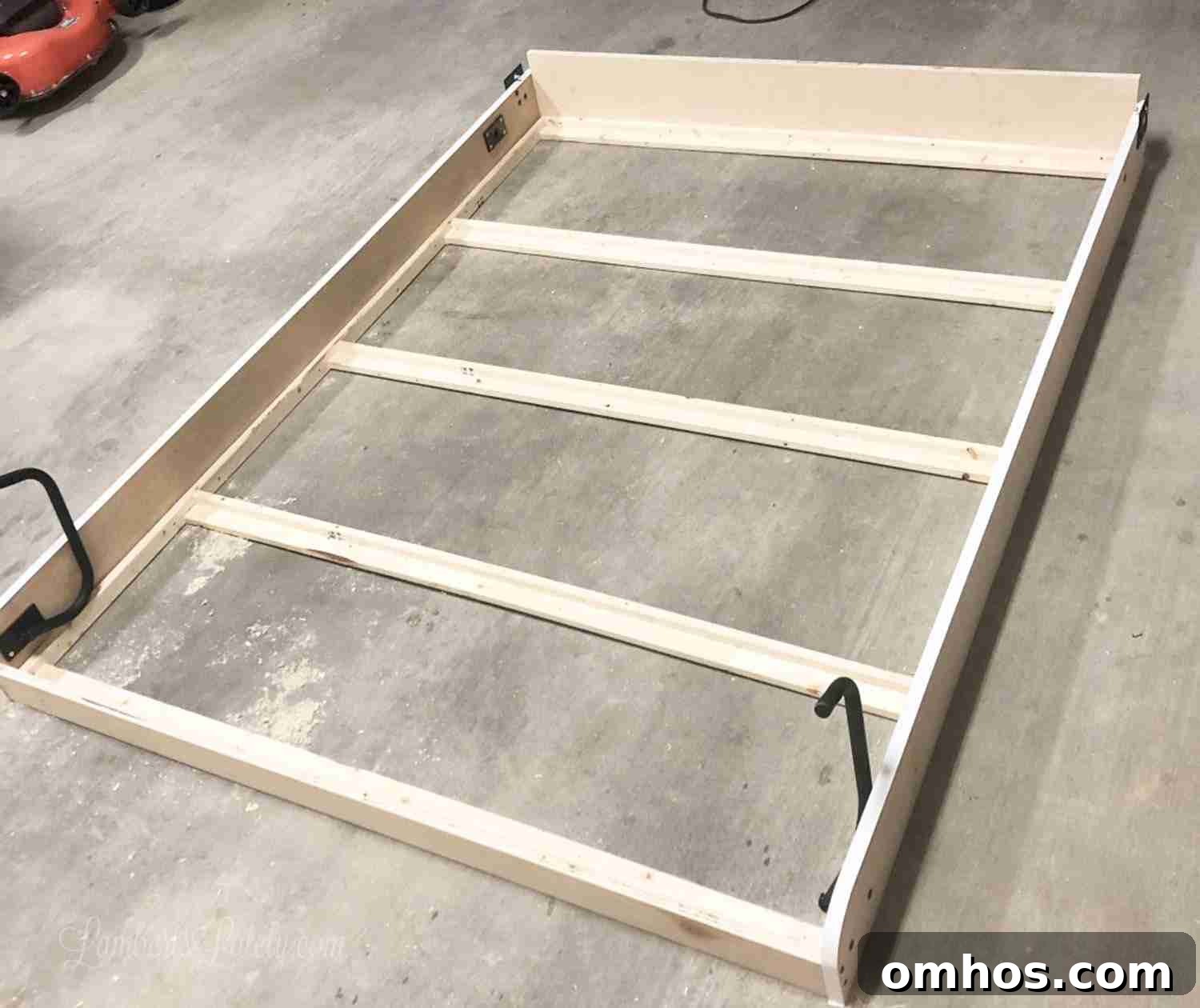DIY Murphy Bed with Built-In Desk and IKEA Bookcases 8 frame of murphy bed without front pieces.