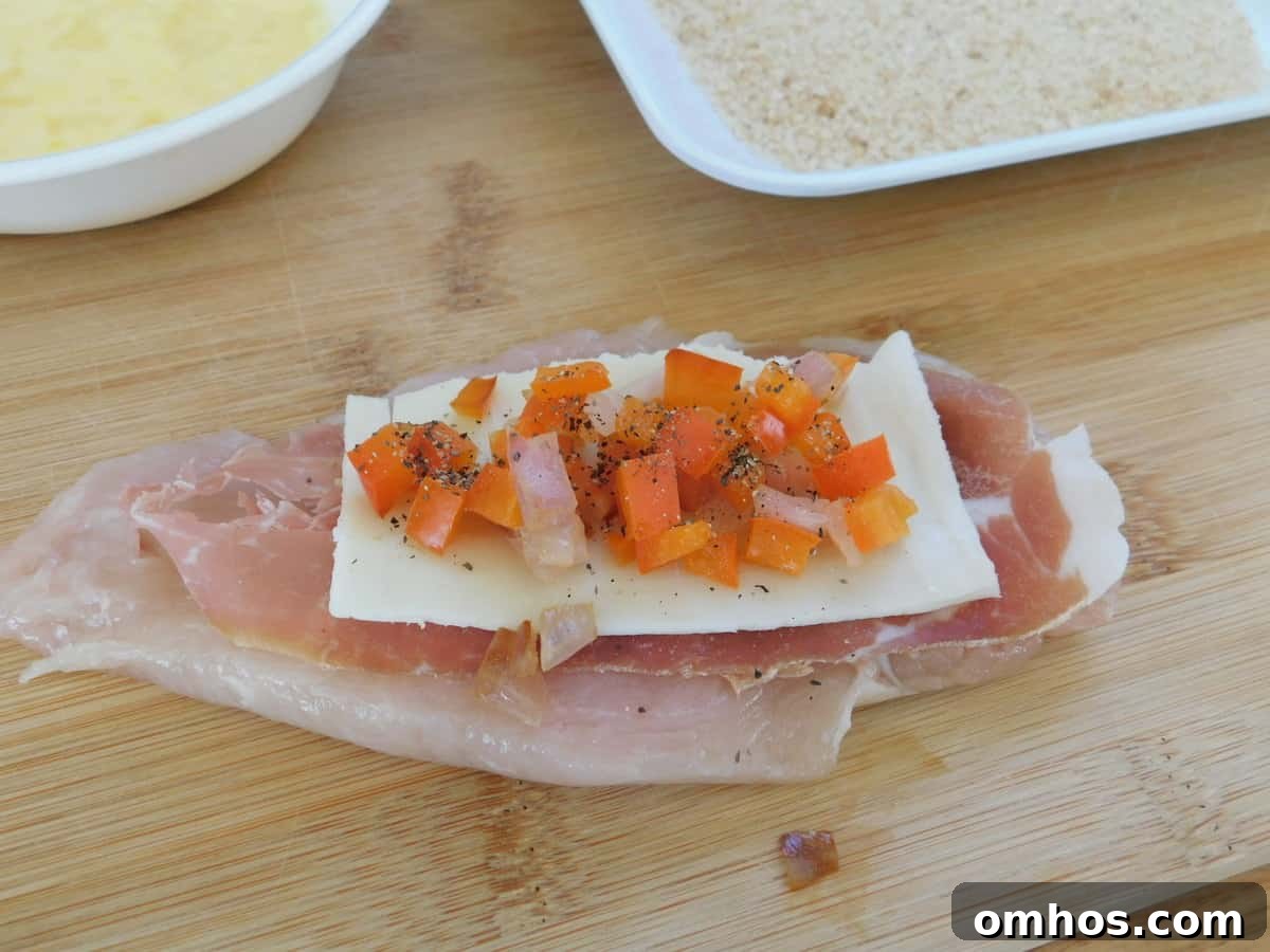 Stack of prosciutto mozzarella chicken rolls